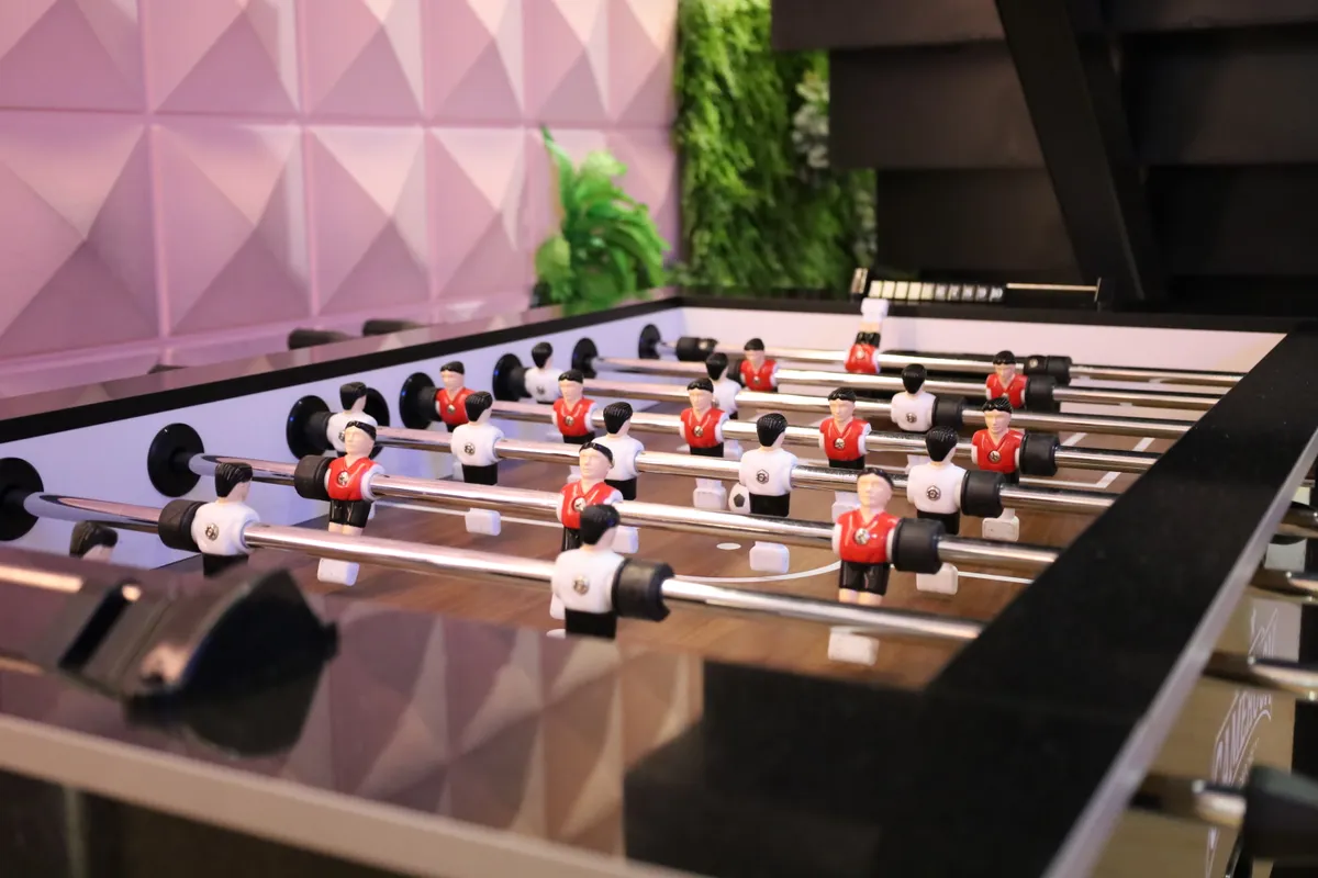 The Loft foosball table with textured accent wall